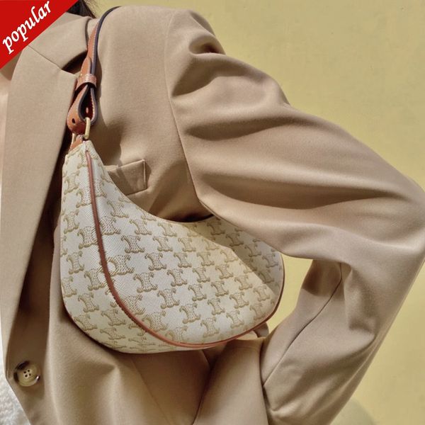 

2022 new women's high sense hand fashion armpit simple style shoulder bags