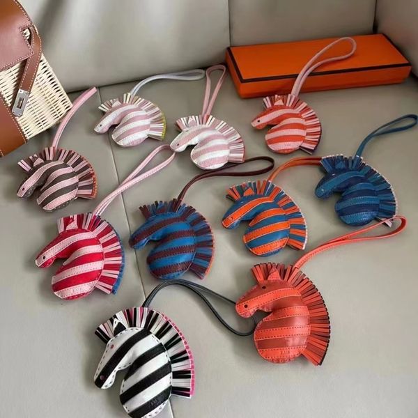 

2022 new men's keychains pendants zebra hand-sewn sheepskin leather bags h pendant tassel pendant car key chains, Silver