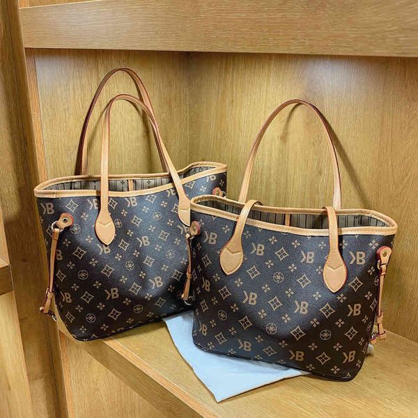 

factory outlet laohua large capacity women's bag 2022 new one shoulder portable student mommy child mother tote bag