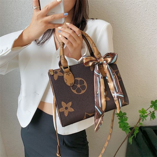 

factory direct 68% off korean one shoulder messenger net red small square bag fashion portable foreign style bag women's sense 2022 new