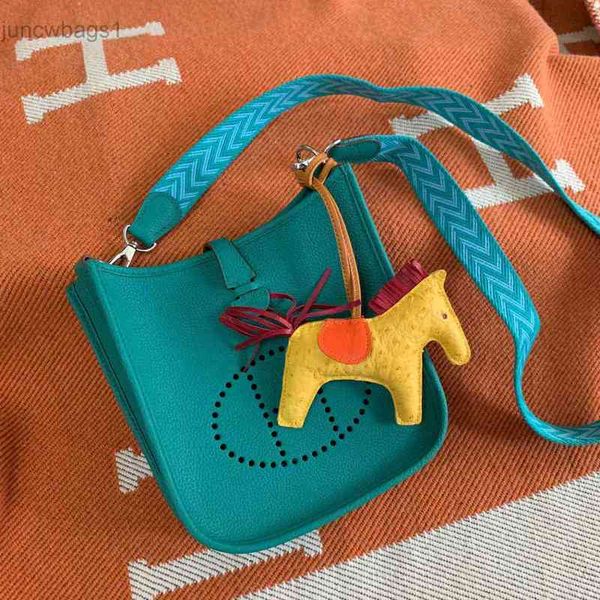 

h family evelyn mini perforated bucket new women's messenger bag texture