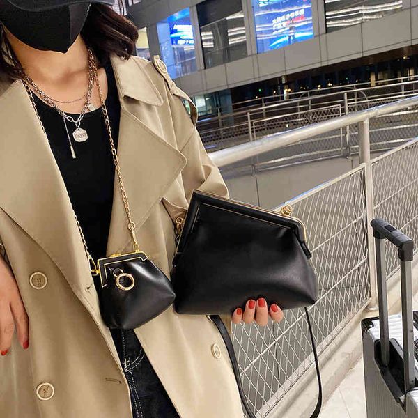 

2022 new designer handbags female solid color single messenger high-end buckle