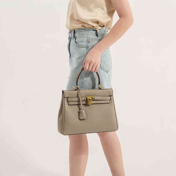

explosive fashion bags heme 2022 style lychee pattern bag fashion trend texture pu messenger bag hand women's