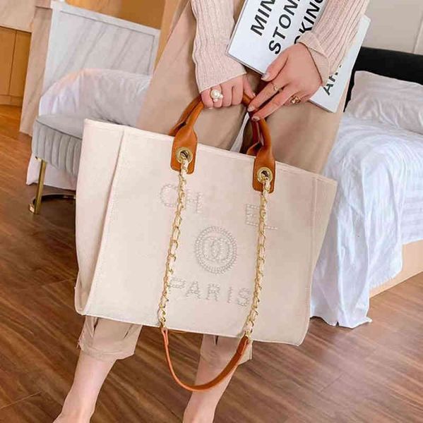 

luxury classic designer beach bags tote label pearl evening bag portable large capacity female fashion canvas handbag brand women handbags l