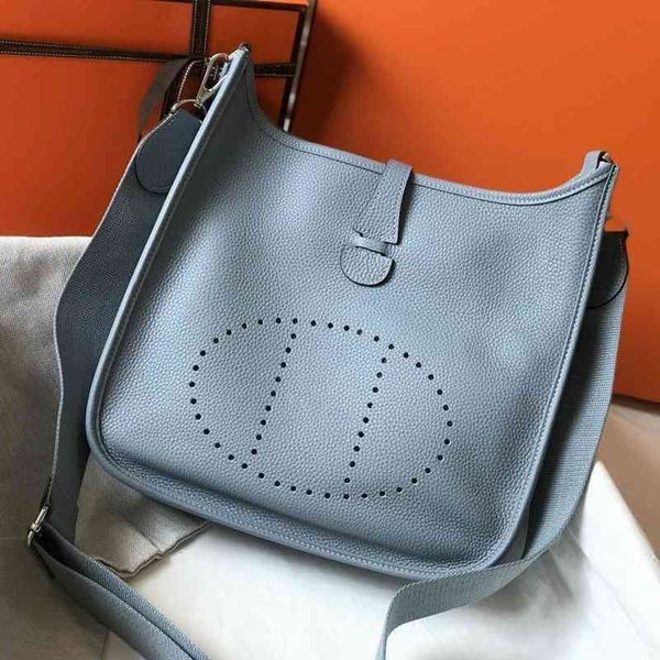 

herme designer handbag early spring and summer calf leather vertical wide hollow out evelyn litchi pattern tote bucket bag single shoulder