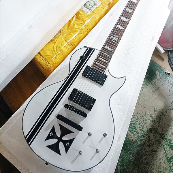 

6 string white electric guitar with cross pattern rosewood fretboard
