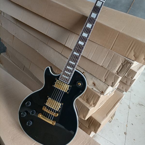 

6 strings left handed black electric guitar with gold hardware rosewood fretboard