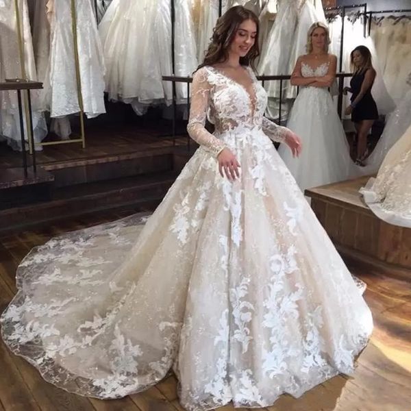 2022 Abiti da sposa in pizzo A Line Profondo scollo a V Abito da sposa Sheer maniche lunghe See Through Abiti da sposa Sweep Train Vestidos