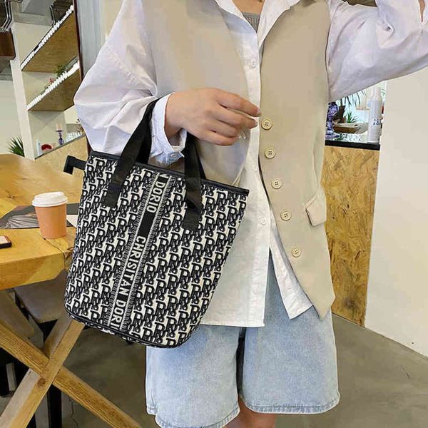 

new designer luxury bags black and white toiletshoulder bag