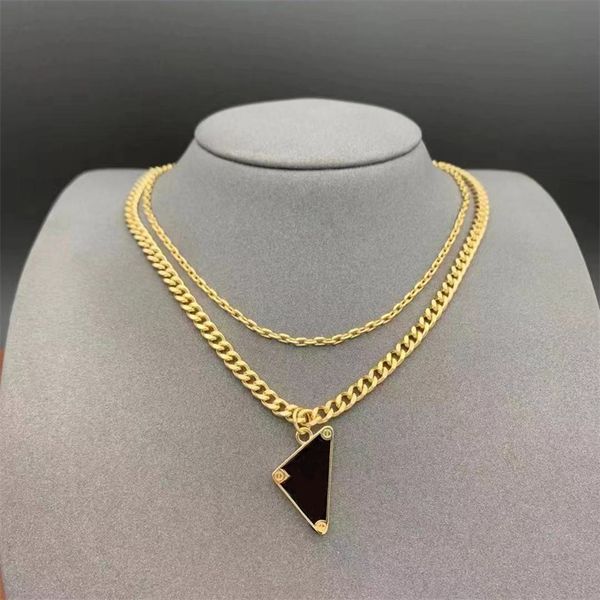 catena da uomo in argento collane firmate in oro catena pulcino gioielli di design di lusso pendente a triangolo rovesciato diamanti bianchi neri lettera timbro pendenti designer