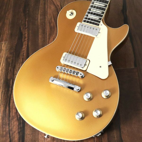 

les lp 70s deluxe gold electric guitar #83 same of the pictures