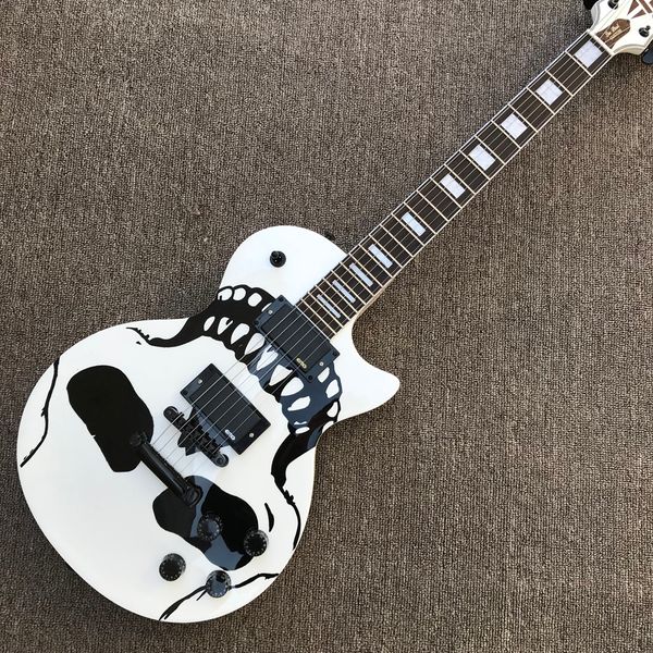 

rosewood fingerboard electric guitar, black skull black hardware, solid mahogany body same of the pictures