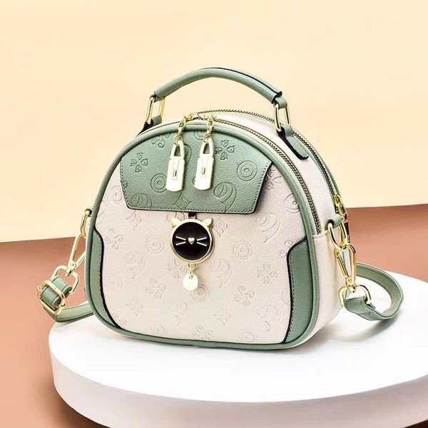 

2022 new leather women's shoulder bag hand-held messenger round print summer fashion all-match niche trend