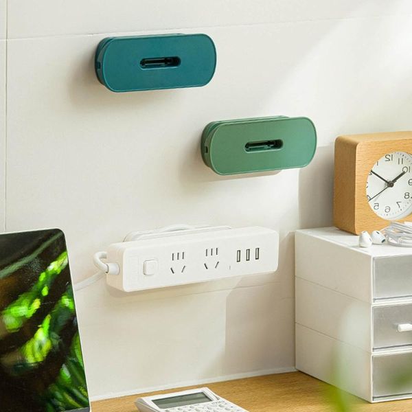 Ganci Rails Socket Fixer Cable Wire Organizer Punch Free Self Sticker Hanger Rack per la casa Camera da letto Supporto per ciabatta a muro Suppli