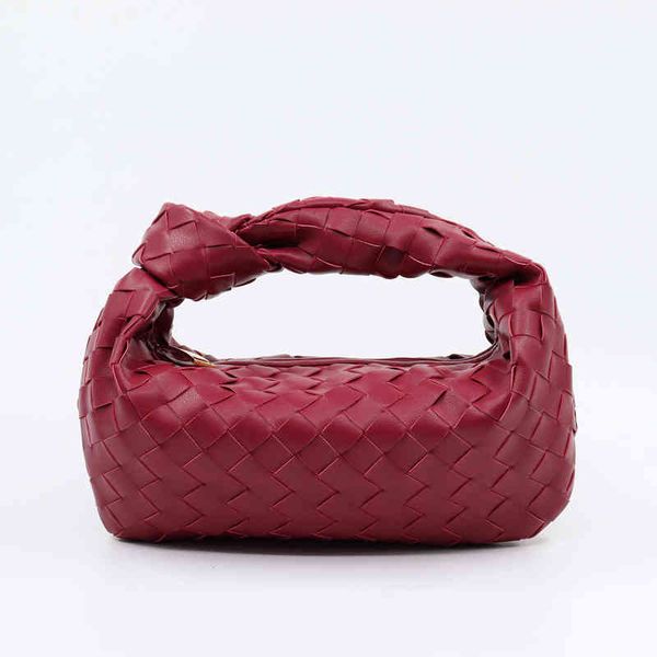 

soft cowhide woven ox horn bag hand carrying large bag large capacity clip pleated dumpling bag 220426