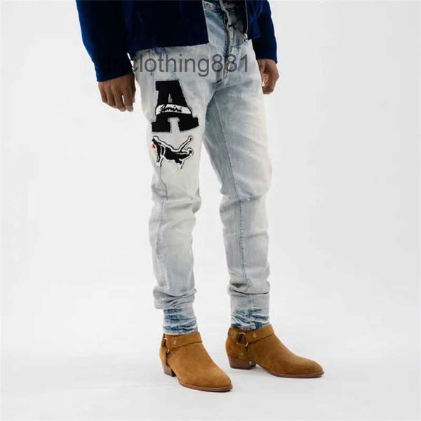 

european and american designer amirss jeans fashion brand washed old blue knife cut holes suede letter paste cloth slim fitting je
