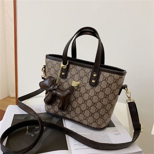 

discounts hand four seasons simple and versatile bucket wide shoulder strap bag 65% off handbags store sale