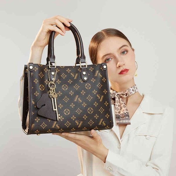 

leather women's 2022 new wide strap handbag lattice tote shoulder large bag2022 trendy fashion design ladies sachet