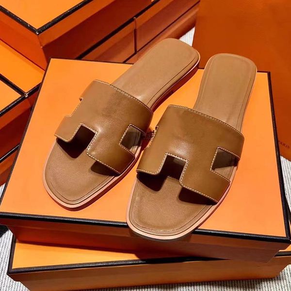 Designer Sandals Designer Mulher Slides Paris Luxury Modand Brand Sandália plana Tamanho 35-42 Modelo LD01