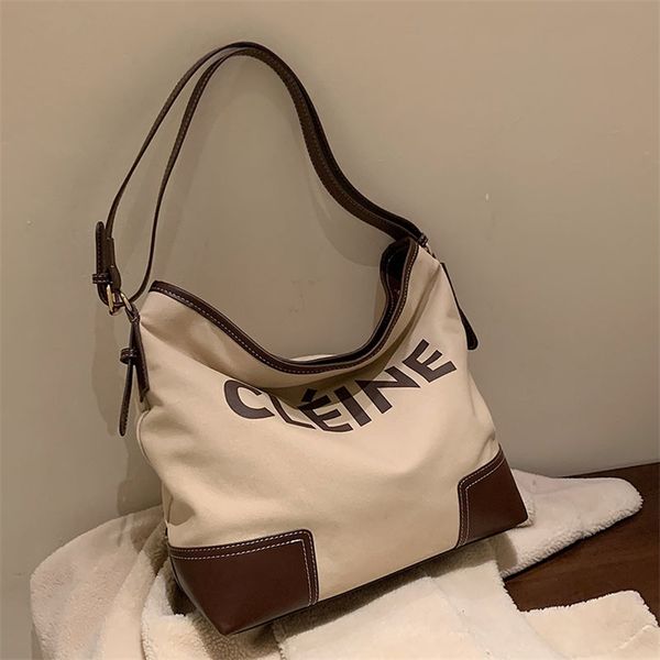 

factory discount 66% off letter contrast canvas 2022 winter new korean version leisure capacity women's one shoulder large tide bag