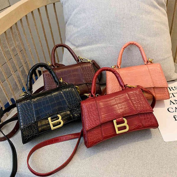 

women's bag 2022 spring new hand minis fashion patent leather single shoulder texture messenger