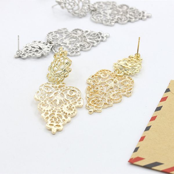 

bohemian hollow out leaf dangle earrings women figure alloy leaves stud earrings european trendy dress party ear drop jewelry gold silver bl