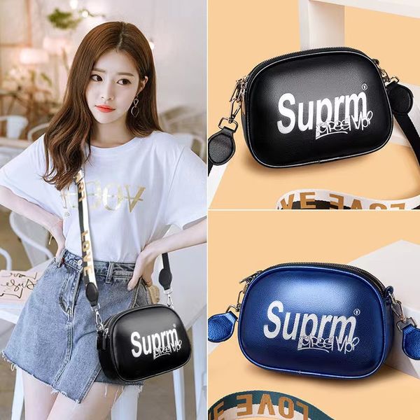 

summer makeup bag popular handbag female 2022 new style printed messenger bags wide shoulder strap fashion bright leather small round bag
