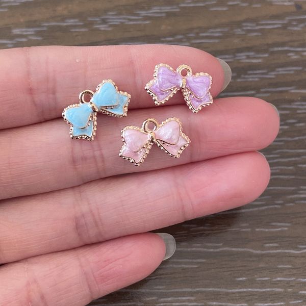 

50pcs cute expoxy light blue purple pink bow knot charm for diy jewelry making charms bracelets pendant necklace earrings keychains bookmark, Bronze;silver