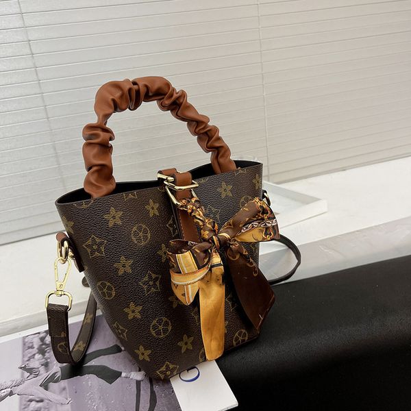 

wholesale factory ladies leathers shoulder bags sweet and lovely bow ribbon handbag street trend printing bucket bag two-piece fashion contr