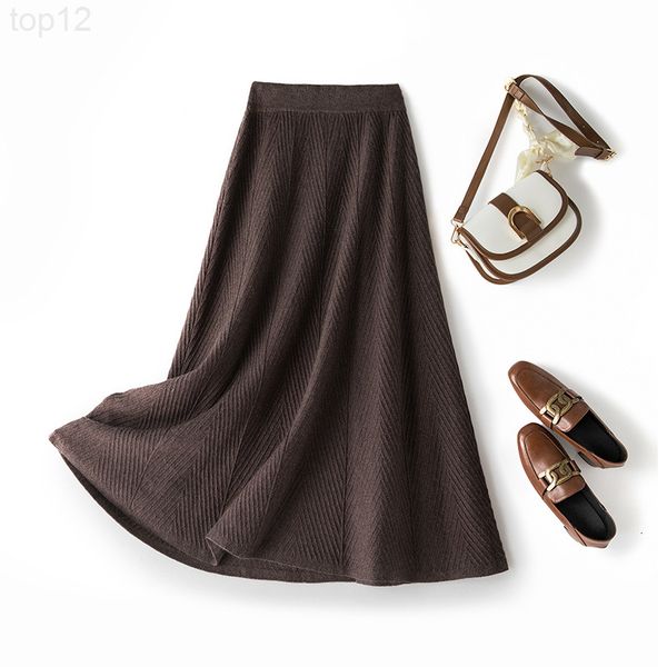

designer women's half length skirt early spring 2022 new medium high waist thin and loose a-word black thickened knitted long for women, White