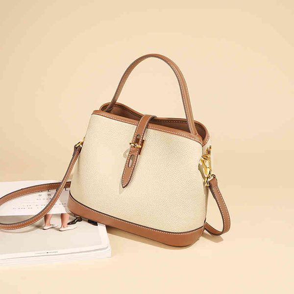

bag female summer 2022 new high sense niche design women's commuting leisure leather portable messenger bucket