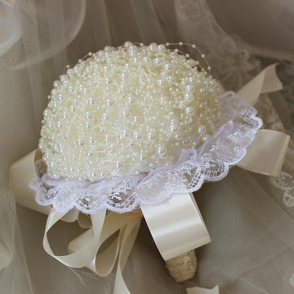 

flowers full pearls ivory accessories jewelry pearl chain handmade bridal holding flowers luxury props wedding bouquet
