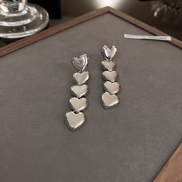 

silver needle heart-shaped long earrings european and american fashion metal cold style ear stud earring design personality trending earring, Golden