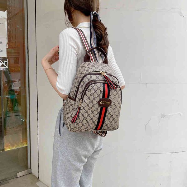 

2022 new designer handbags luxury chao brand soft leather capacity printed schoolbag net red
