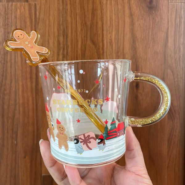 

starbucks cup gingerbread man stirring stick meets heat discoloration cabin glass coffee cup water cup christmas gift