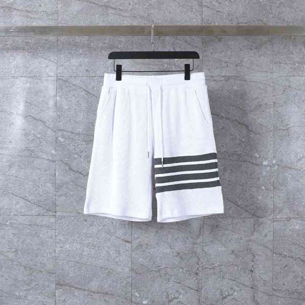 

new casual shorts elastic waist jacquard bar splicing men's women's same versatile straight, White;black