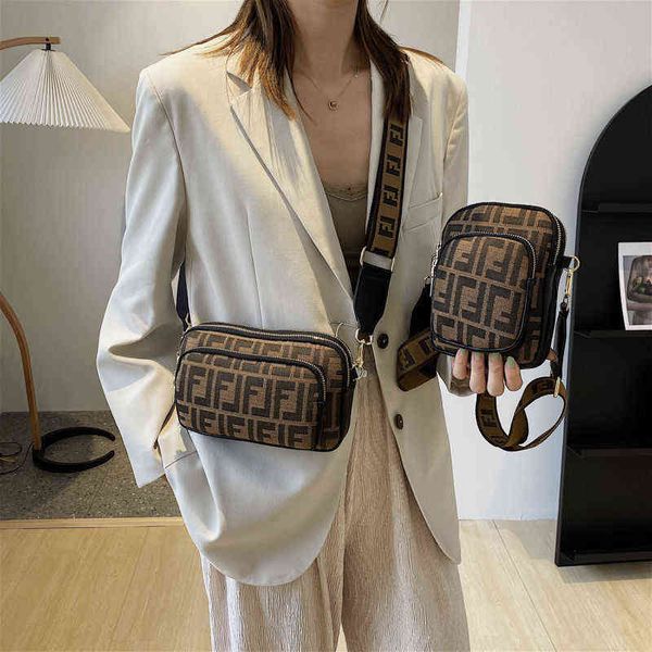 

autumn new messenger bag wide shoulder belt simple cylinder pillow embossed women's