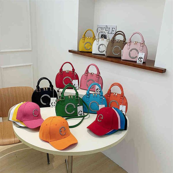 

factory direct sale bag 2022 spring new diamond encrusted shell station single shoulder msenger portable set women's designer