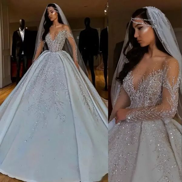 2022 Dubai Arabisch Luxus A-Linie Brautkleider Formelles Brautkleid Juwelenhals Illusion Sheer Kristall Perlen Lange Ärmel Satin Rückenfrei Vestido Plus Size