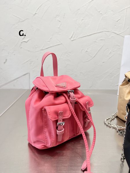 Borsetti di tono di alta qualità rosa Nylon lussuoso mini designer di zaino di lusso da donna tasche per sacchetti esterni con cinturini a catena metallica con centesimi di grande capacità della scuola dimensioni 17 cm