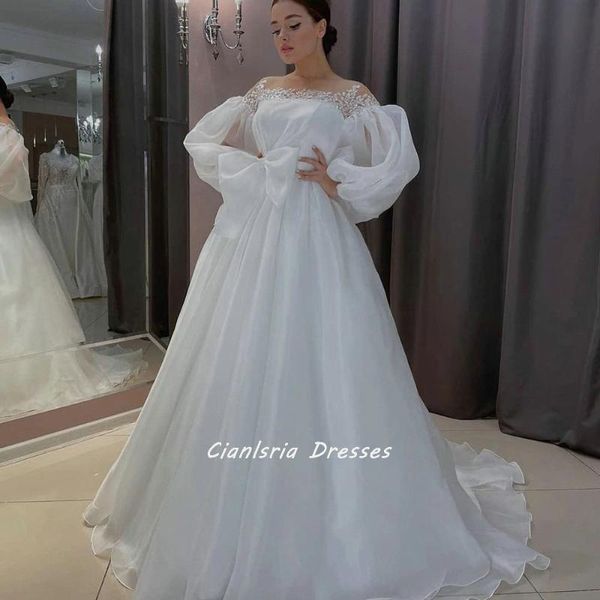 Altri abiti da sposa Organza semplice Illusion O-Collo Abito da ballo Dubai Abito lungo con maniche a sbuffo Appliques Fiocco in pizzo Abiti da sposa arabi sauditiAltro