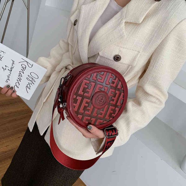 

handbag embossed small round red wide shoulder strap mini