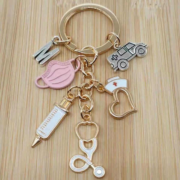

keychains a-z letter keychain doctor medical tool stethoscope syringe mask nurse gift souvenir, Silver