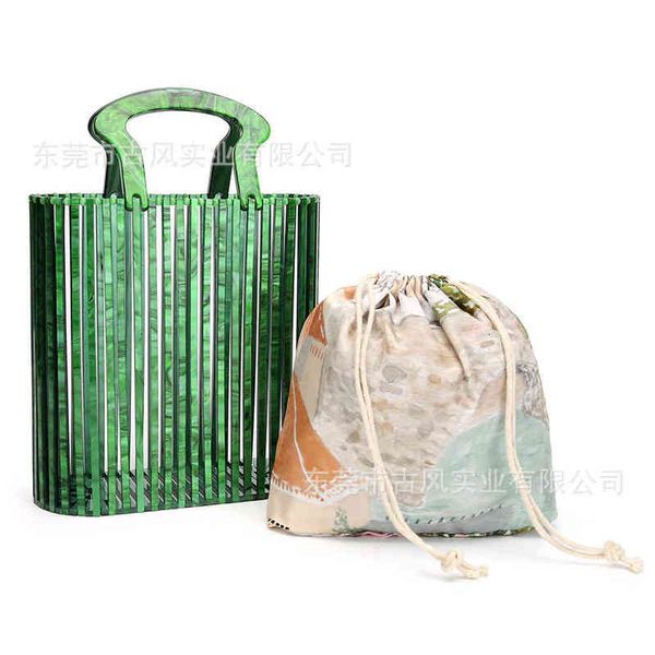 

designers bags 2020 new acrylic bucket bag beach woven women's bag hand wring holding dinner hollow