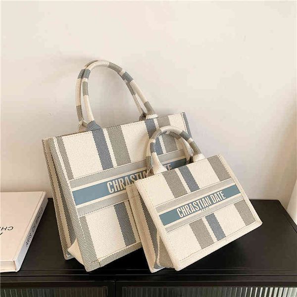 

fashion bag bag shangpin 2022 summer new style note stripe letter canvas portable wo