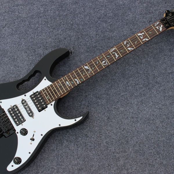 

black electric guitar good quality control years of guitar production