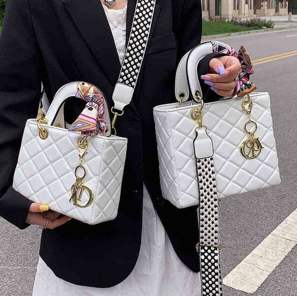 

factory online export designer tide brand ladies bag design women's summer new fashion wide shoulder strap ling lattice portable single