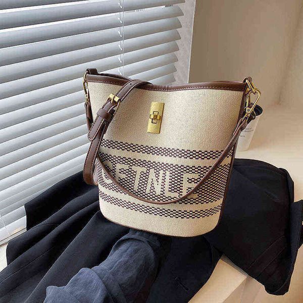 

arc de triomphe bucket bag single shoulder messenger bag wool straw woven 2022 new portable women's trend