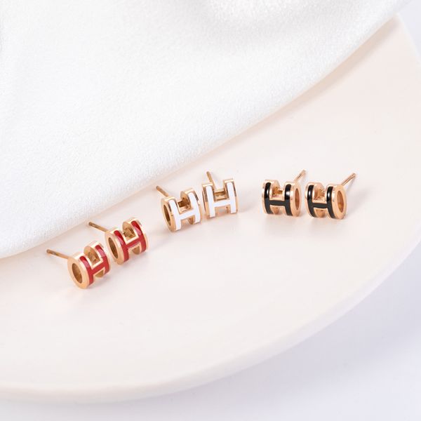 

black white enamel h stud earring, Golden;silver