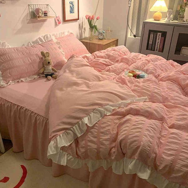 Conjunto de capa de edredão de bobo rosa de bobo rosa 3/4pcs de cama cinza alternativa e leve e travesseiros alternativos com saia de cama e fronhas